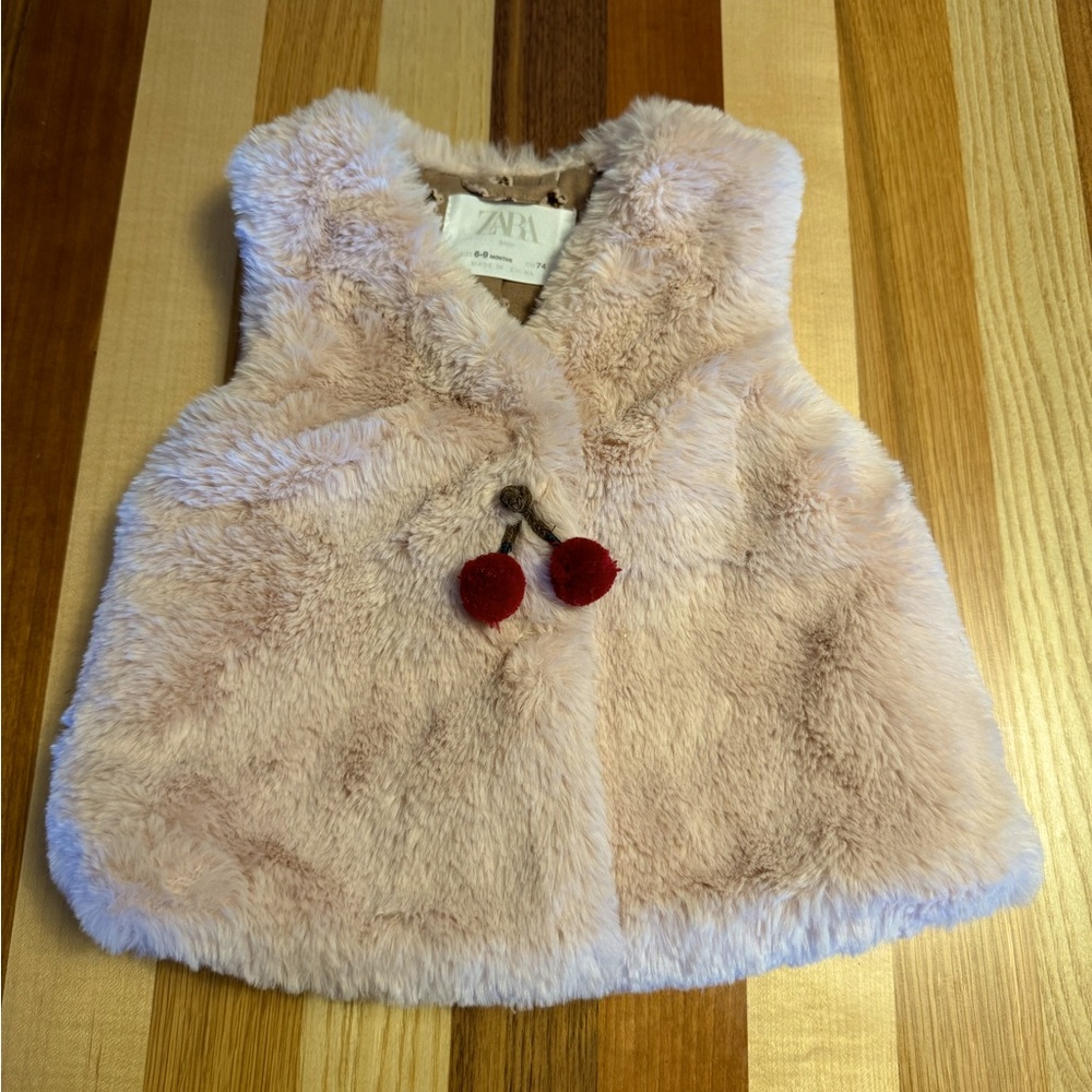 Zara Baby Girl Faux Fur Vest with Cherries detail.